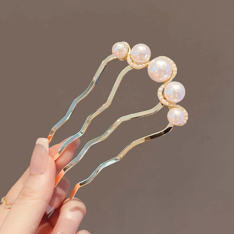 Colette Grace pearl-crowned hair pin in a bun