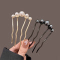 Colette Grace pearl-crowned hair pin in a bun
