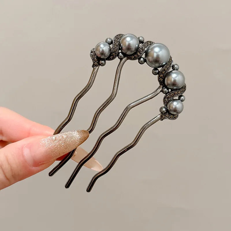 Colette Atelier pearl hair stick in a bun