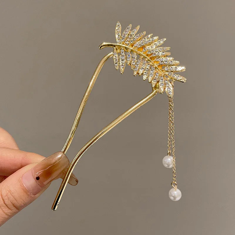 Colette Atelier pearl hair stick in a bun