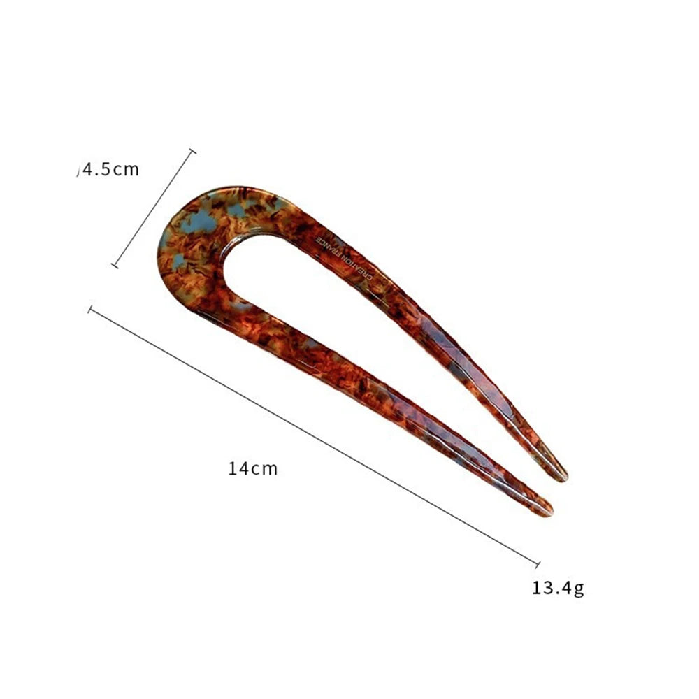 Colette Riviera amber acetate French hair fork