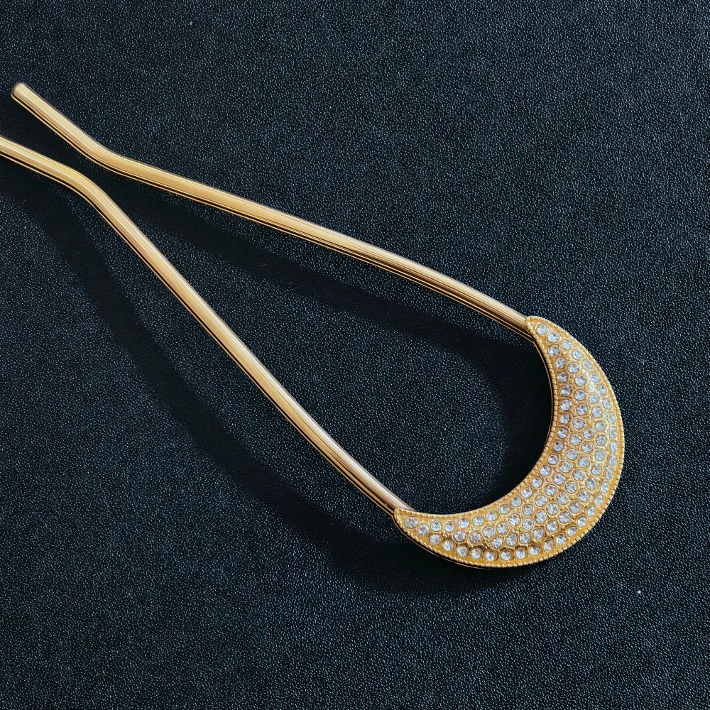 Colette Jardin blue crystal flower hair pin in an updo