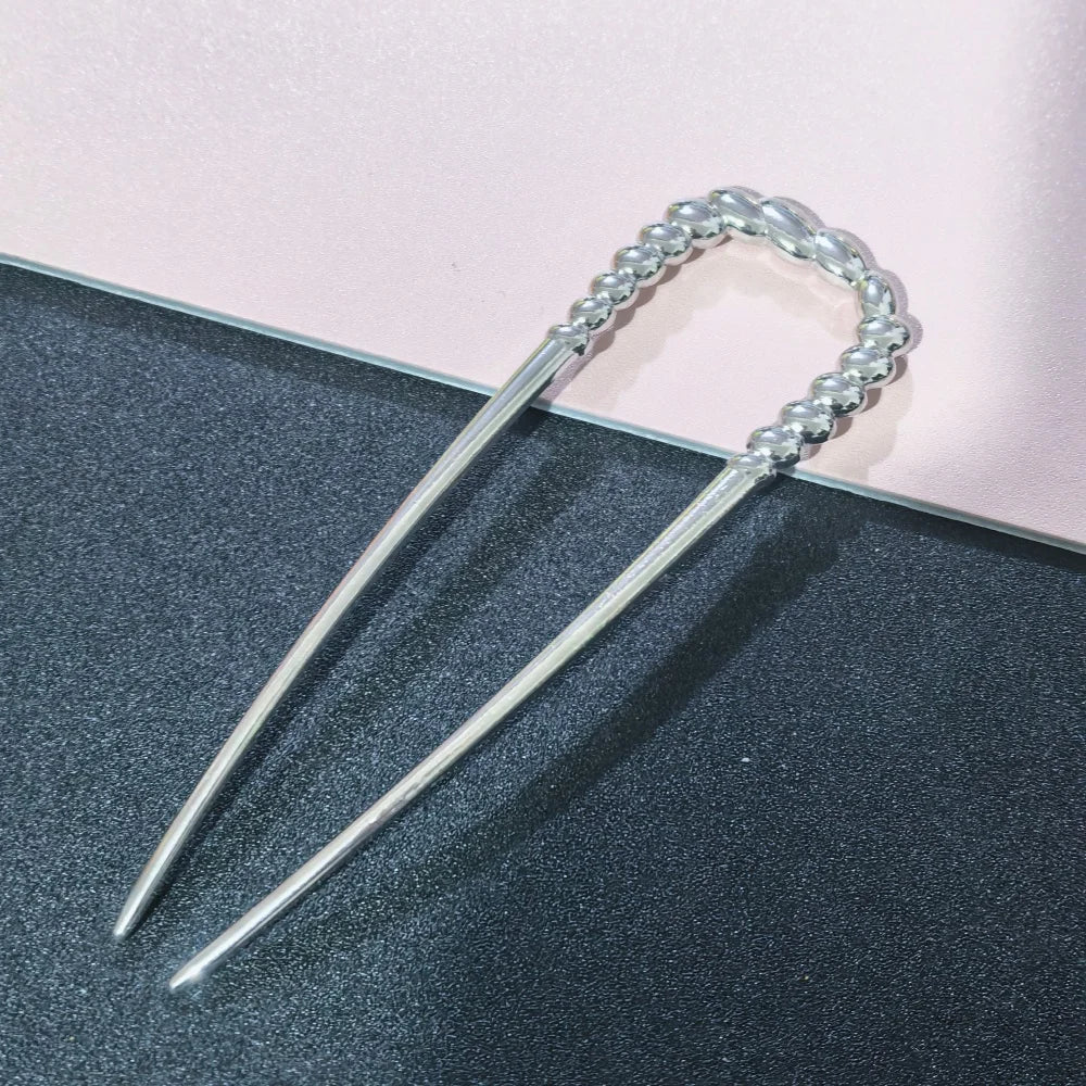 Colette Sculpt wavy metal French hair pin