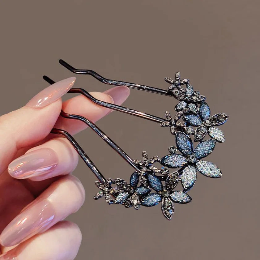 Colette Jardin blue crystal flower hair pin in an updo