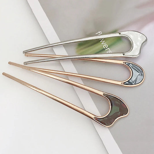 Colette Louvre shell-tipped two-prong French hair pin