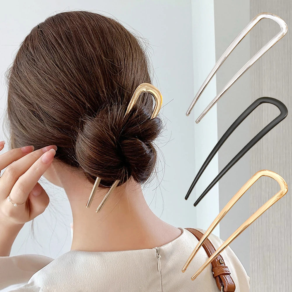 Colette Minimal slim metal hair pin in a bun