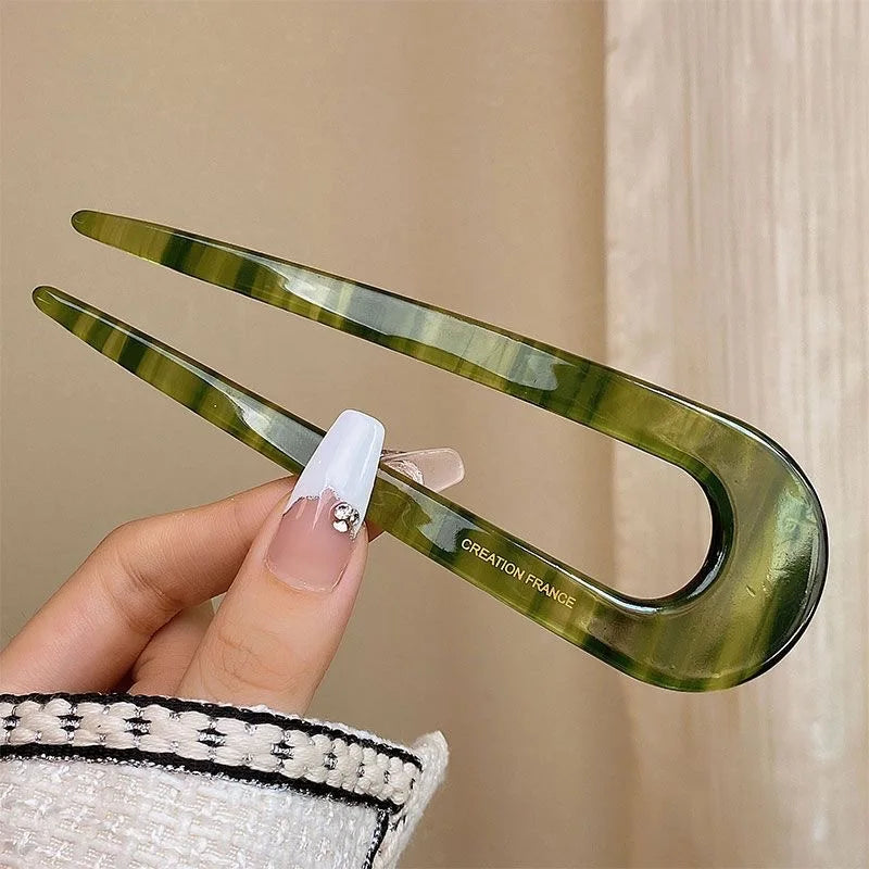 Colette Riviera amber acetate French hair fork