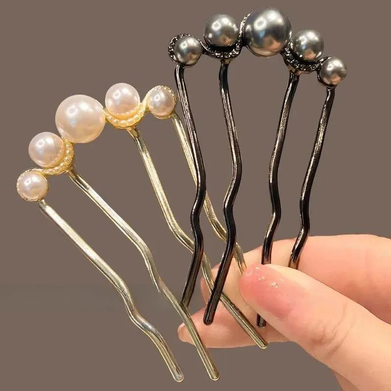 Colette Grace pearl-crowned hair pin in a bun