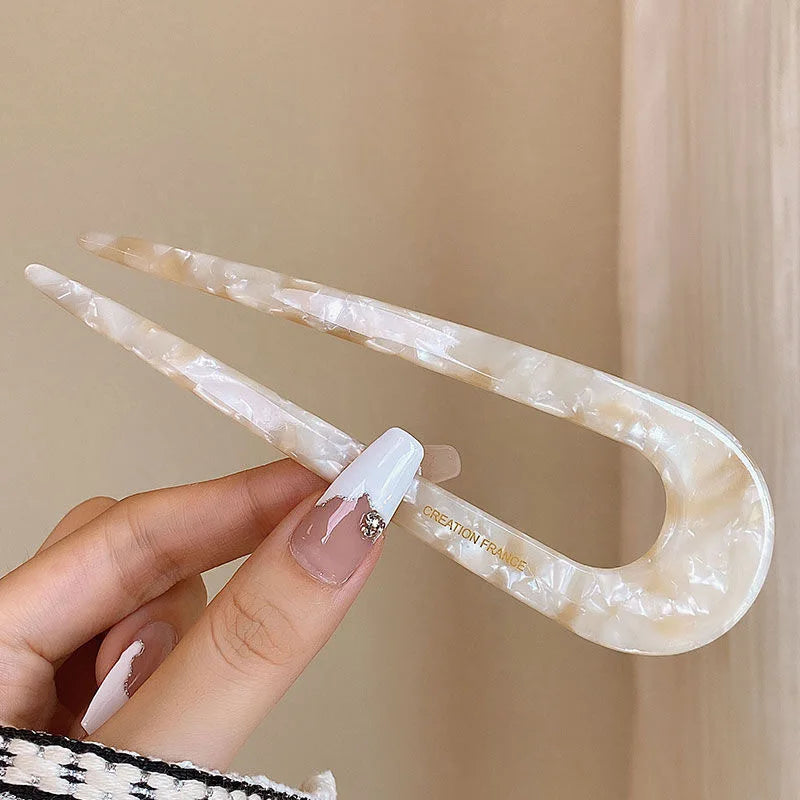 Colette Riviera amber acetate French hair fork