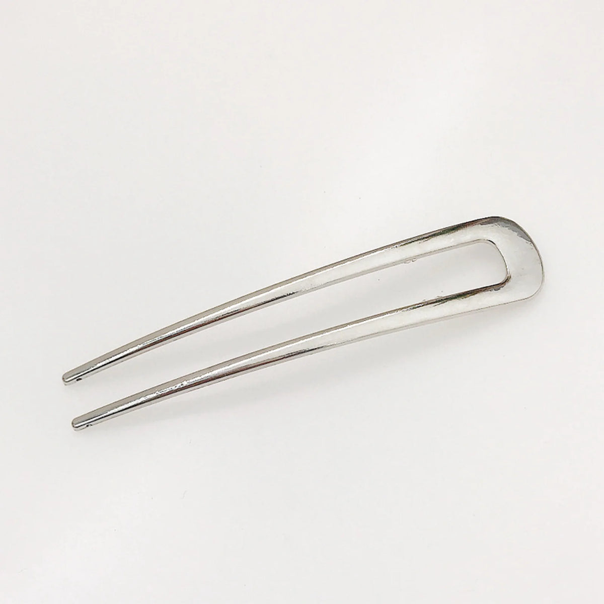Colette Louvre shell-tipped two-prong French hair pin