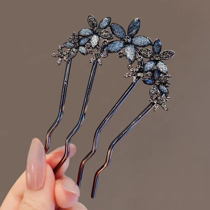 Colette Jardin blue crystal flower hair pin in an updo