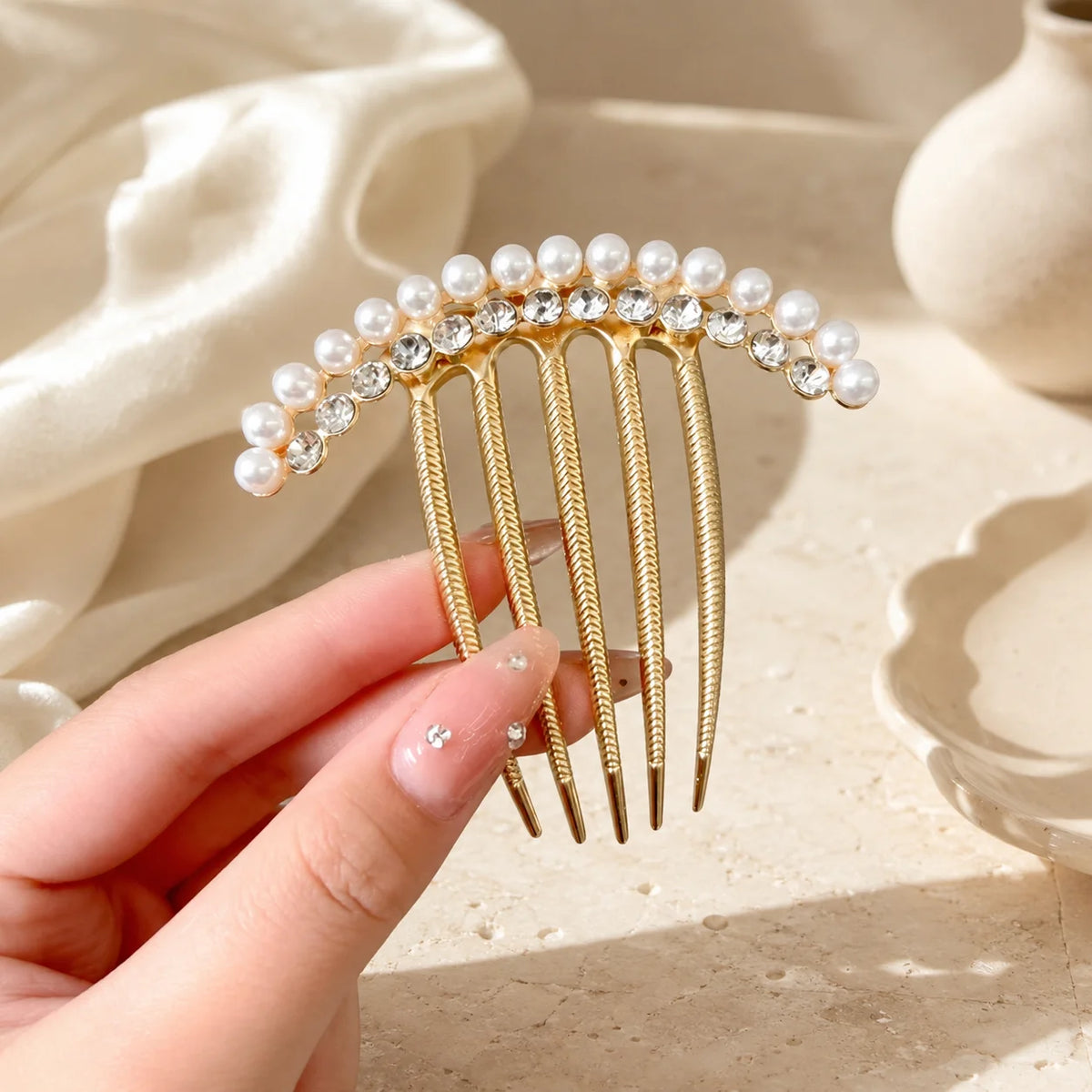 Colette Perle pearl-topped French hair pin in a chignon