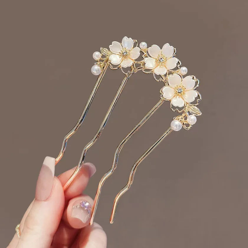Colette Jardin blue crystal flower hair pin in an updo