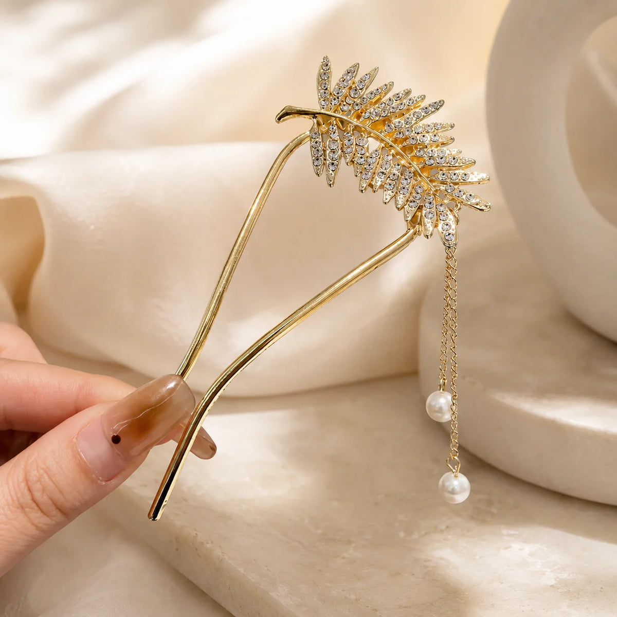 Colette Perle pearl-topped French hair pin in a chignon