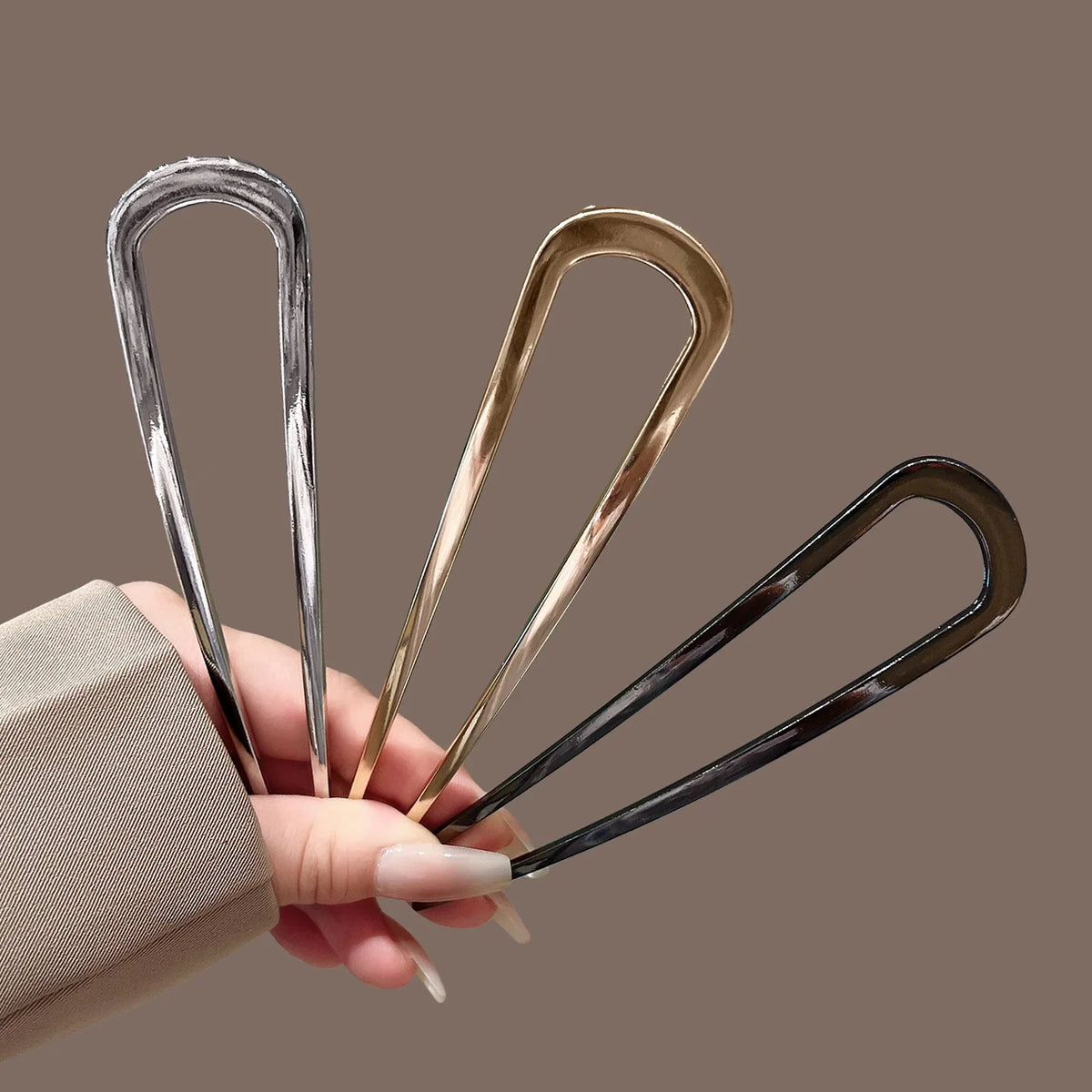Colette Minimal slim metal hair pin in a bun