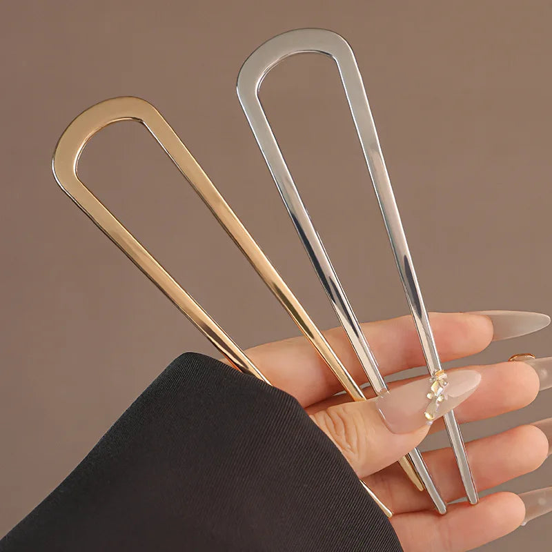 Colette Minimal slim metal hair pin in a bun