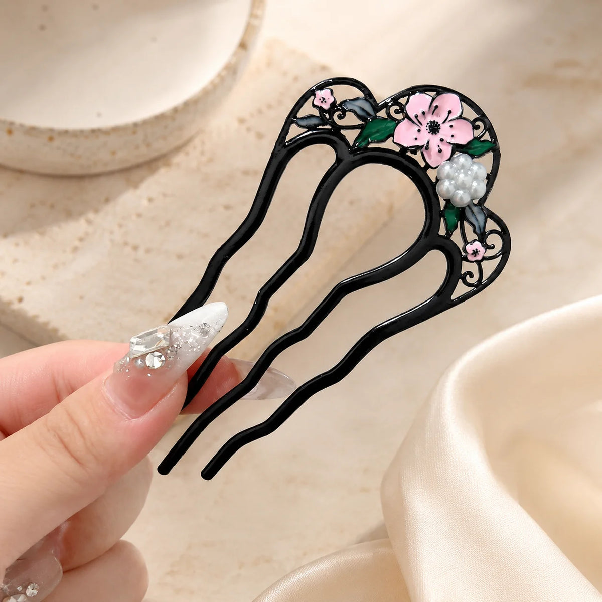 Colette Perle pearl-topped French hair pin in a chignon