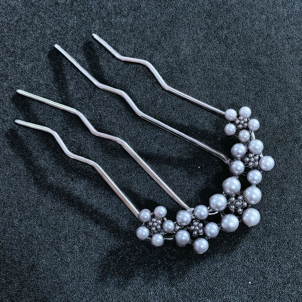 Colette Jardin blue crystal flower hair pin in an updo