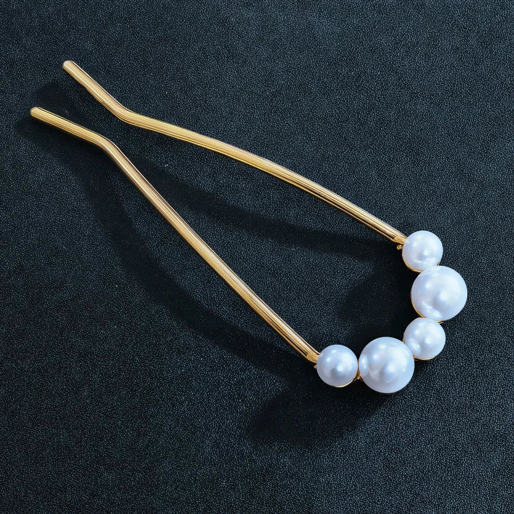 Colette Jardin blue crystal flower hair pin in an updo