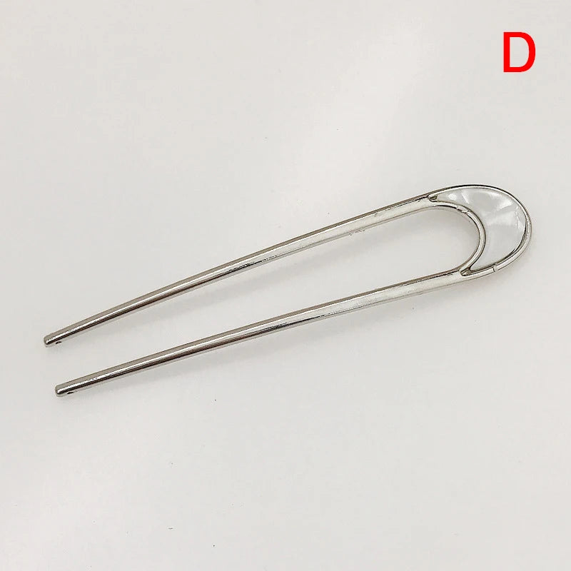 Colette Louvre shell-tipped two-prong French hair pin