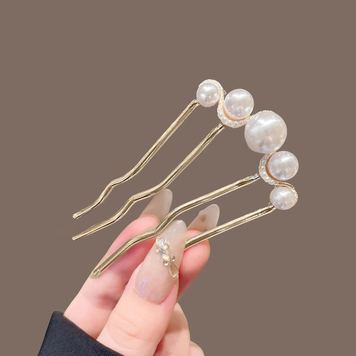 Colette Jardin blue crystal flower hair pin in an updo
