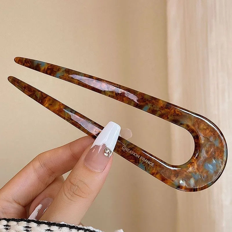 Colette Riviera amber acetate French hair fork