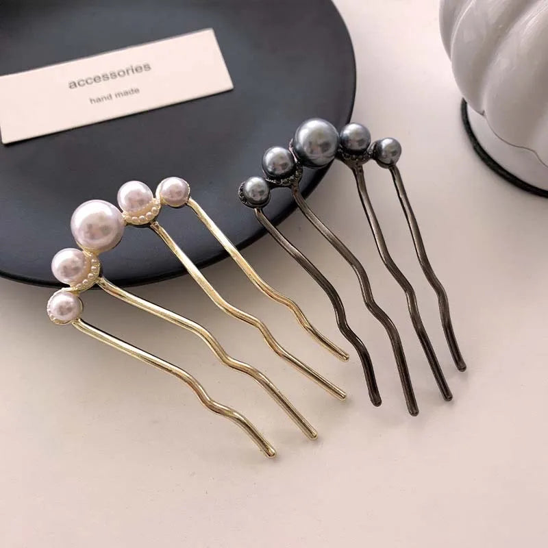 Colette Grace pearl-crowned hair pin in a bun