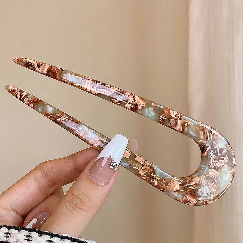 Colette Riviera amber acetate French hair fork