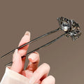 Colette Ginkgo leaf and pearl hair pin in a chignon