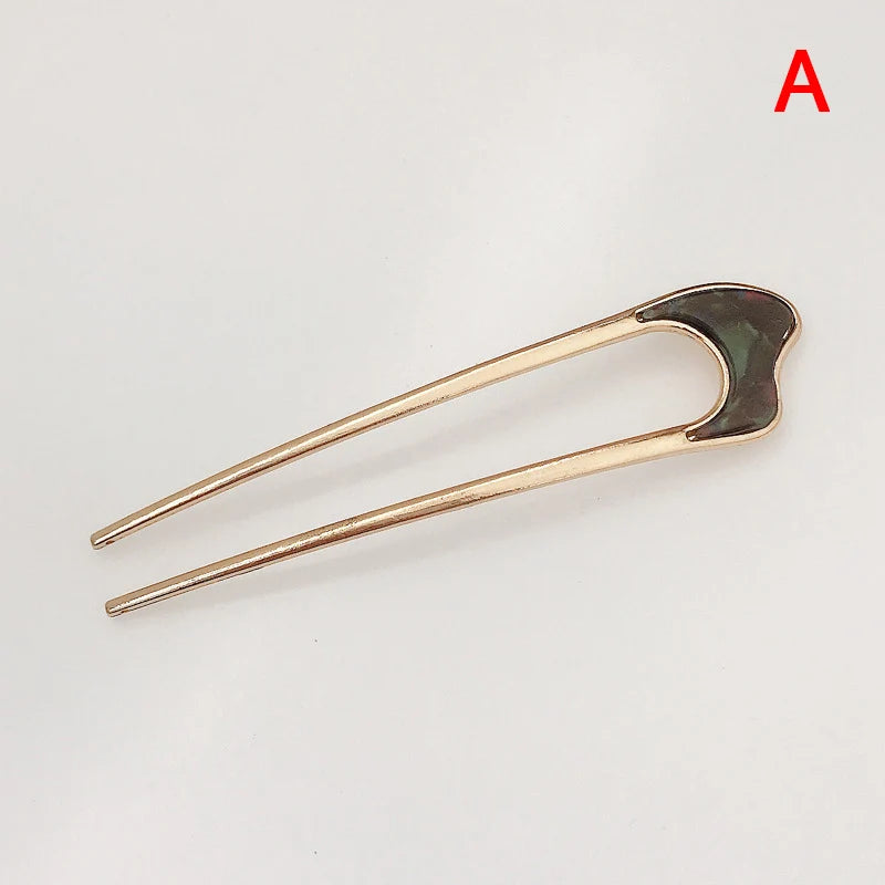 Colette Louvre shell-tipped two-prong French hair pin