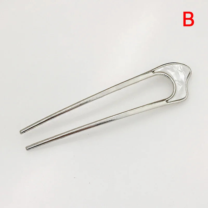 Colette Louvre shell-tipped two-prong French hair pin