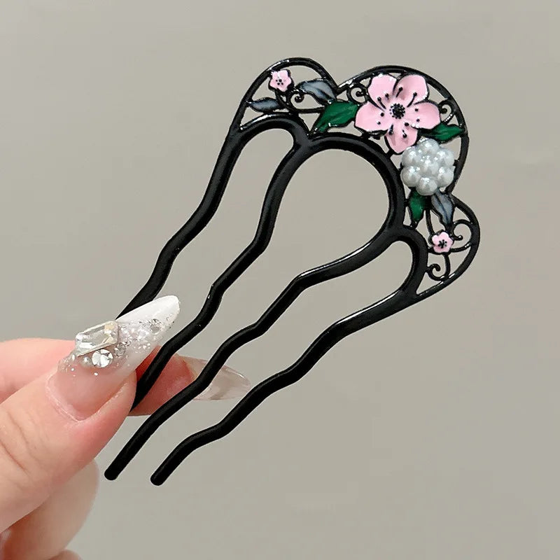 Colette Atelier pearl hair stick in a bun
