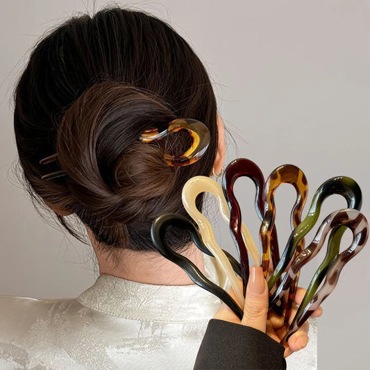 Colette tortoise acetate hair fork, front view