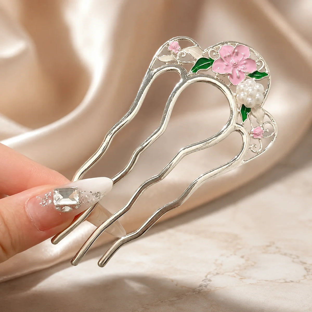 Colette Perle pearl-topped French hair pin in a chignon