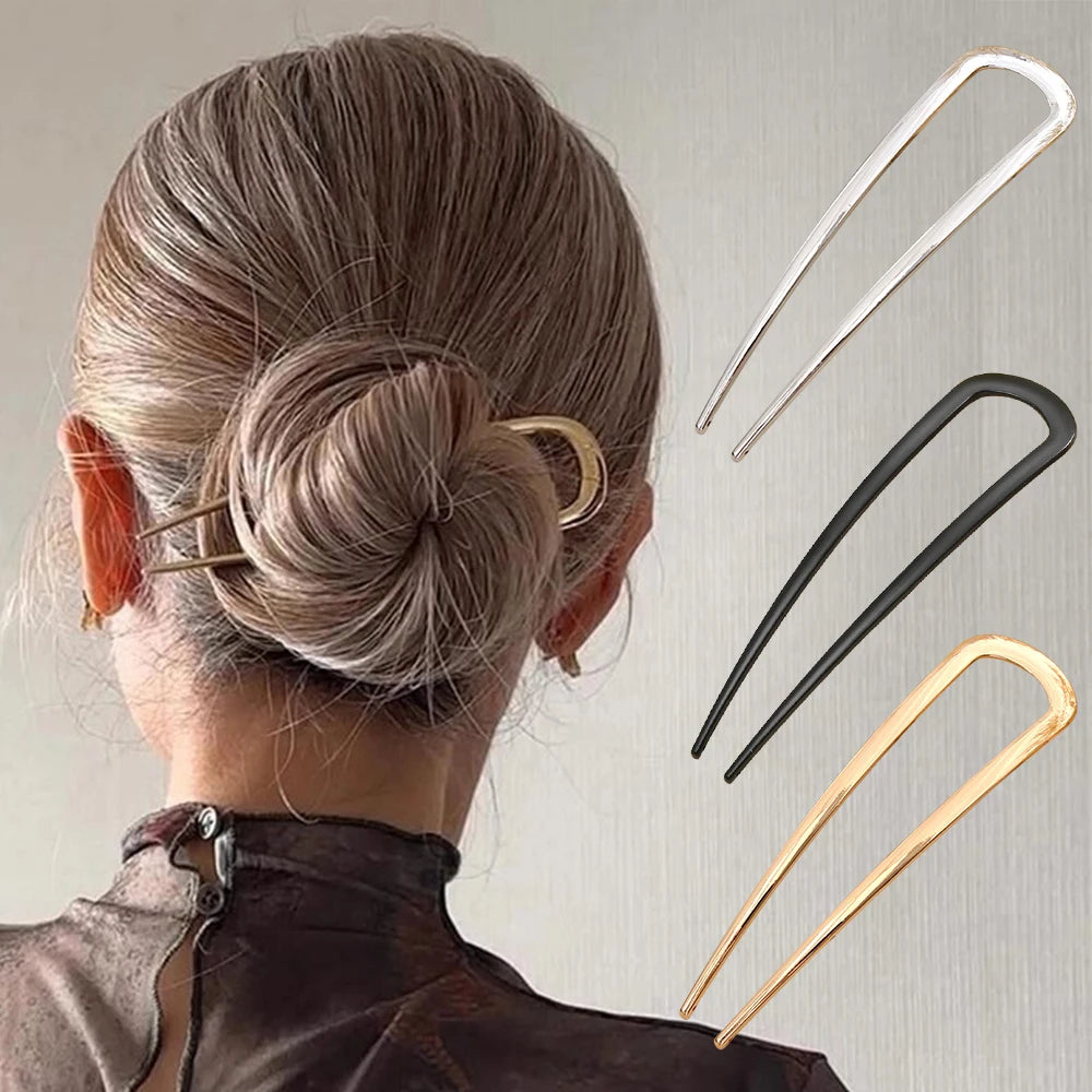 Colette Minimal slim metal hair pin in a bun