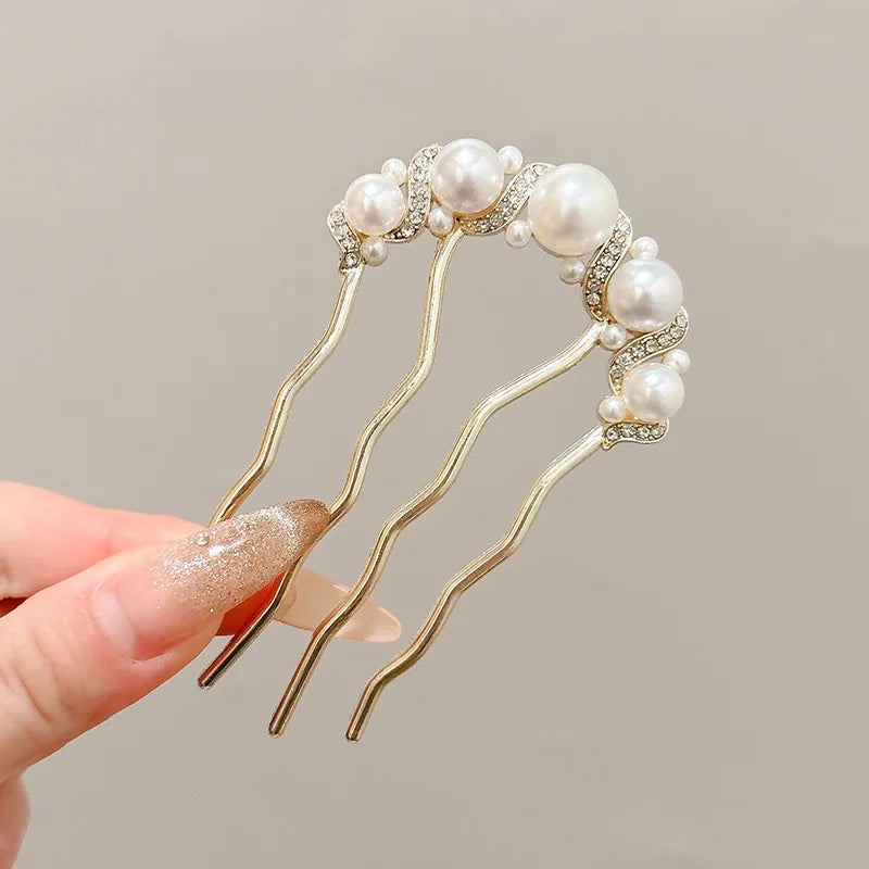 Colette Atelier pearl hair stick in a bun