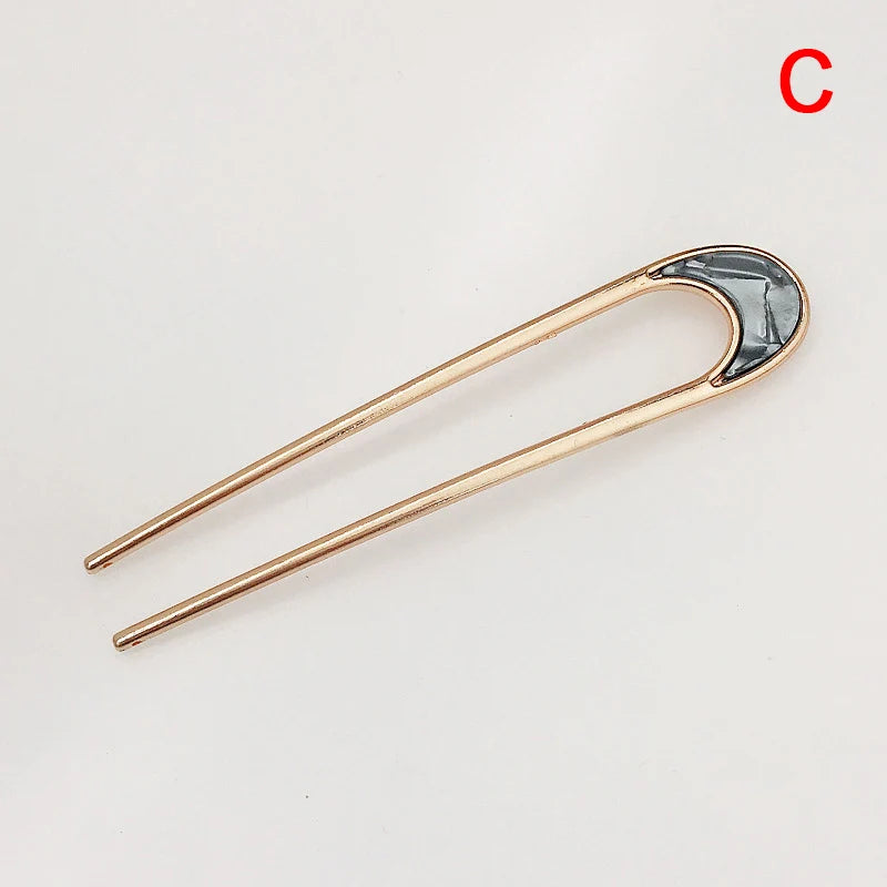 Colette Louvre shell-tipped two-prong French hair pin