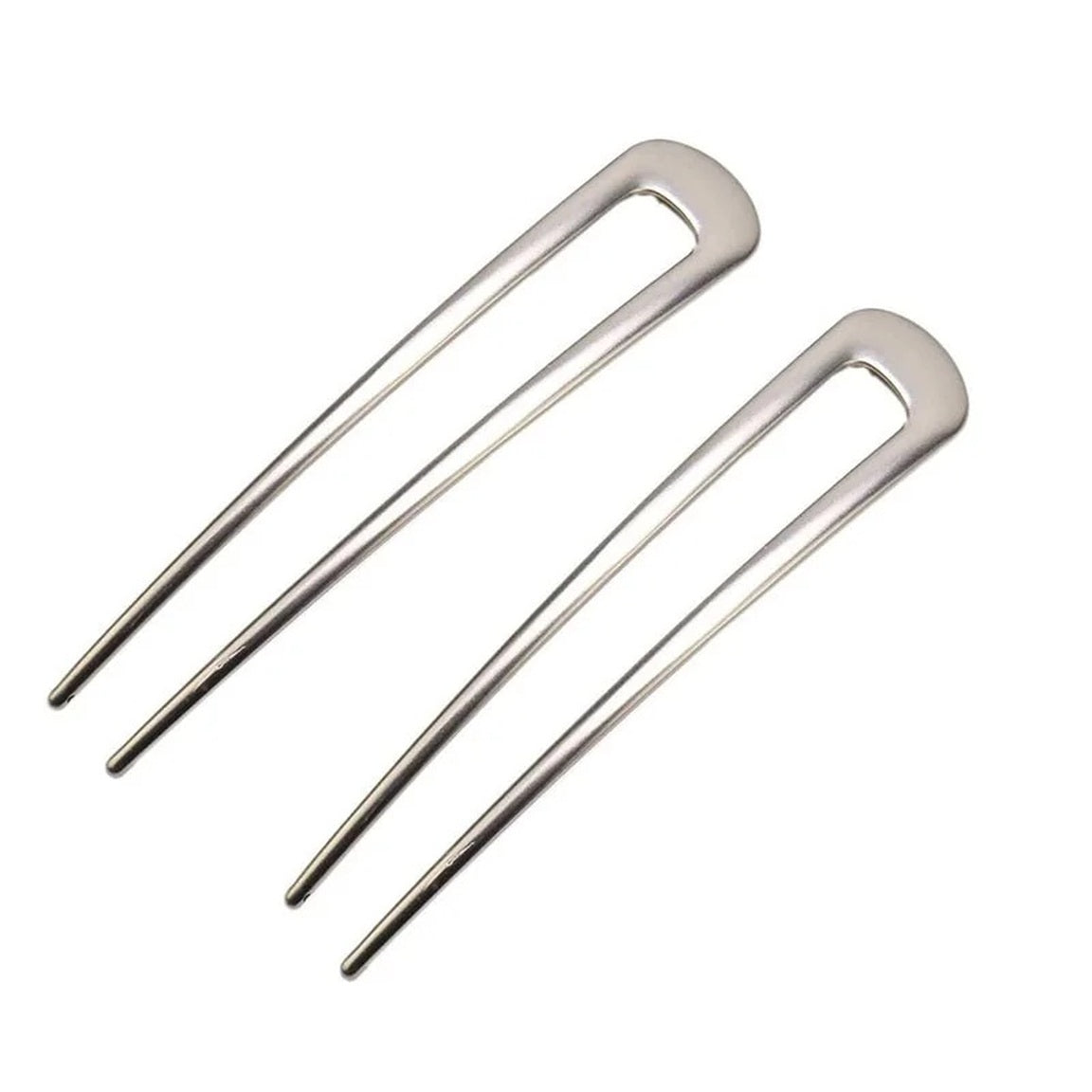 Colette French hair pin worn in a twisted chignon